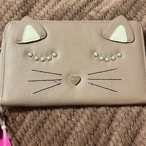 Blush colored Betsey Johnson clutch wallet